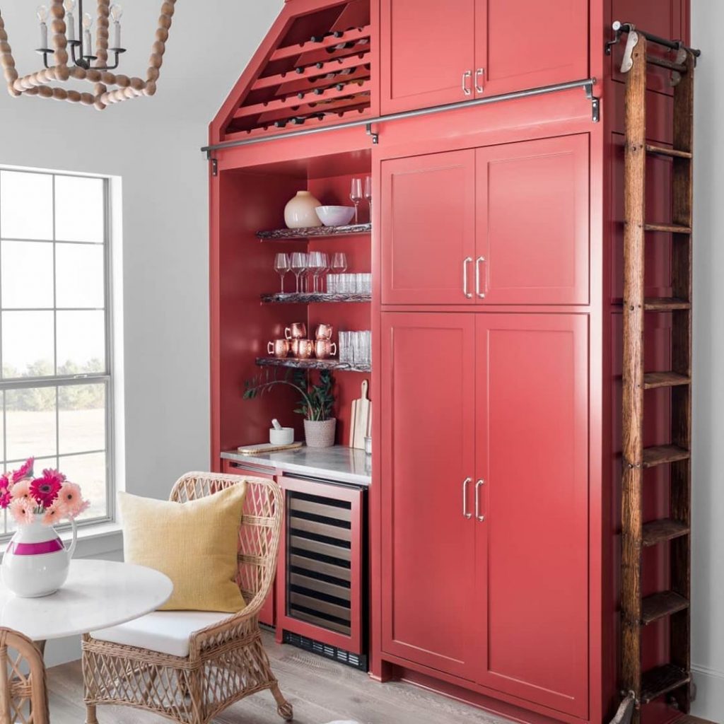 Red kitchen cabinets painted in Benjamin Moore Dinner Party