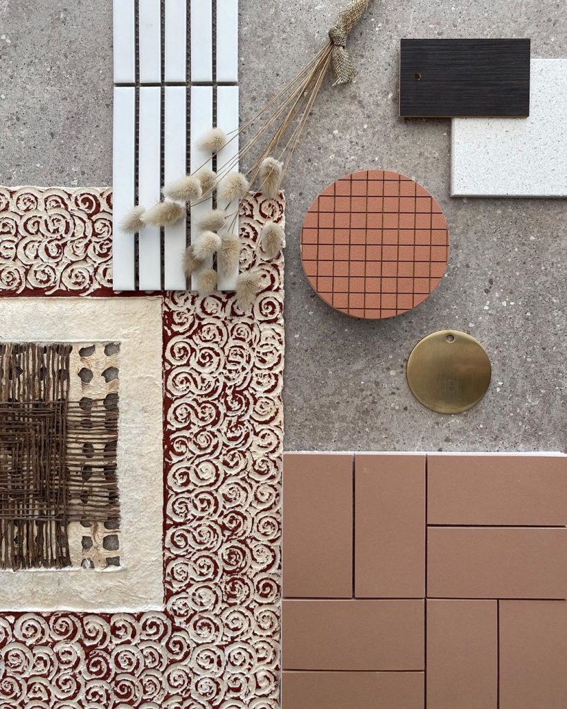 brushed brass and terracotta interior design flat lay styling