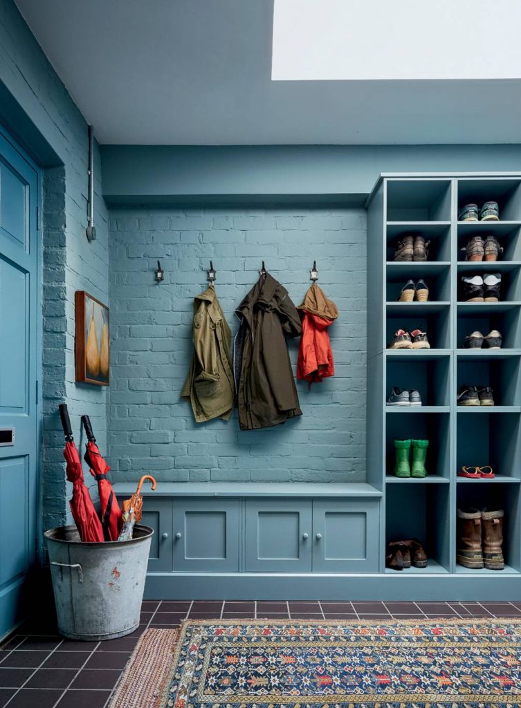 Joinery in the boot room was painted in Farrow & Ball’s ‘Claydon Blue’ to tone with walls in ‘Oval Room Blue’