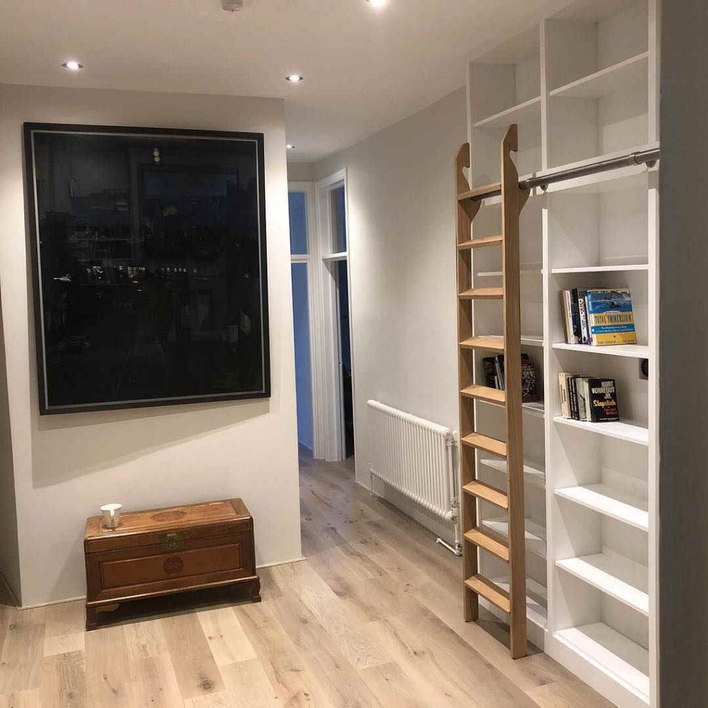 hallway entrance over the door bookshelf small spaces