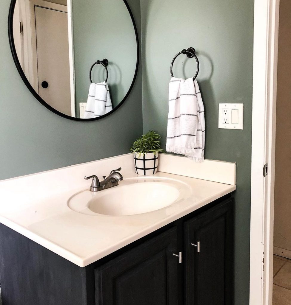 Walls Sherwin Williams Retreat and the vanity in chalked Charcoal