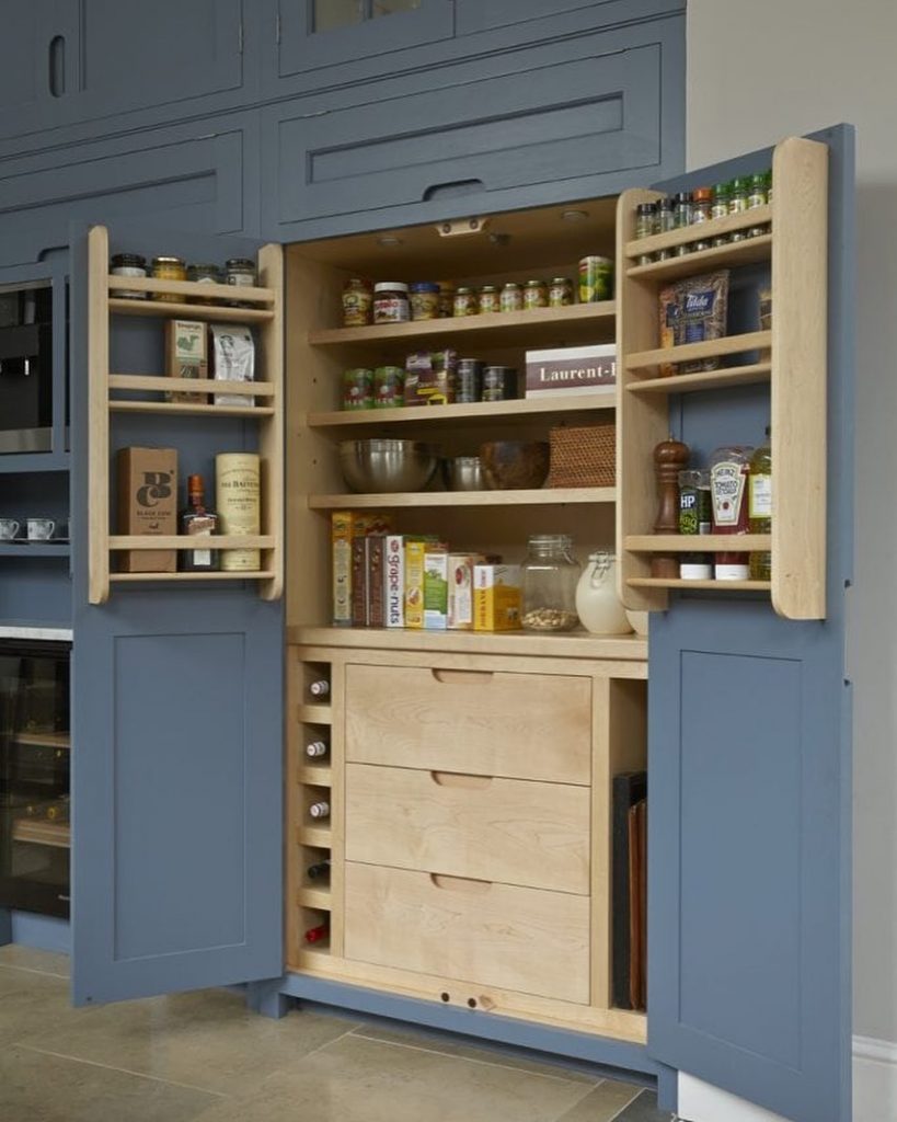 blue and oak kitchen cabinets