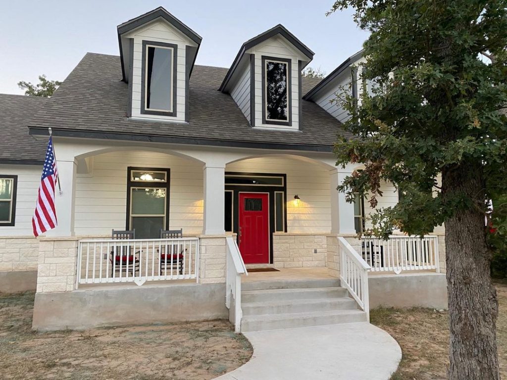 Sherwin Williams Real Red front door.