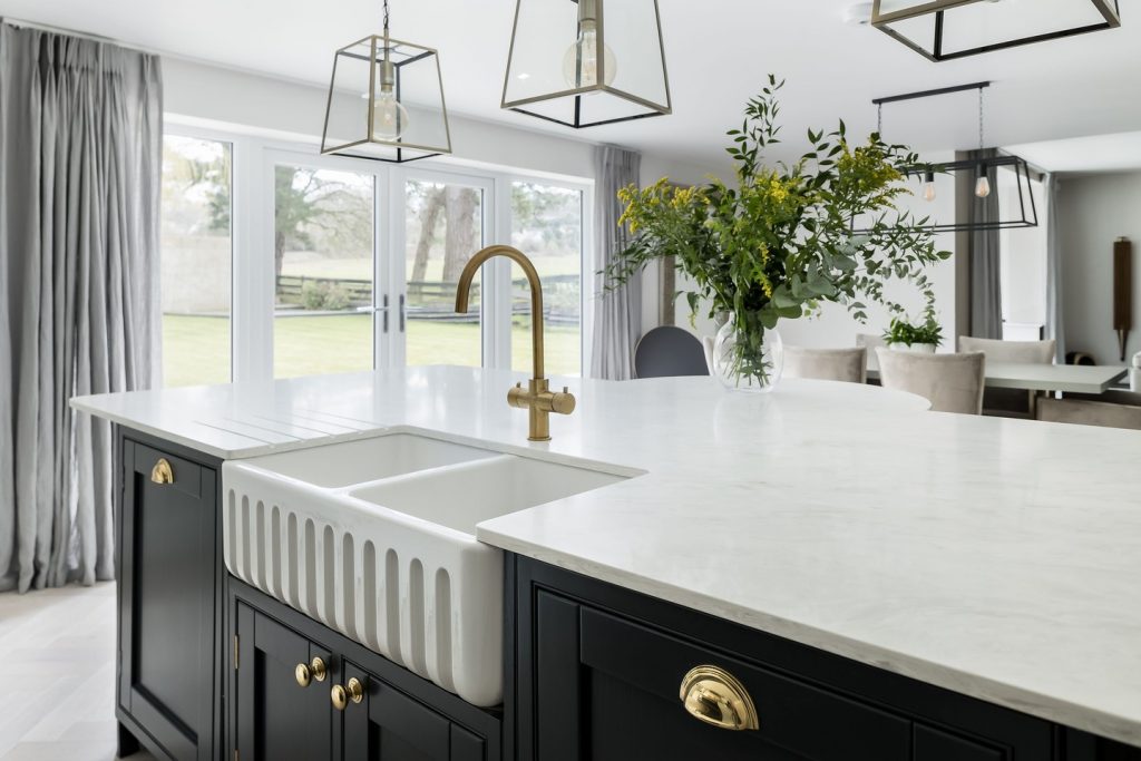 granite benchtop butlers sink brass hardware