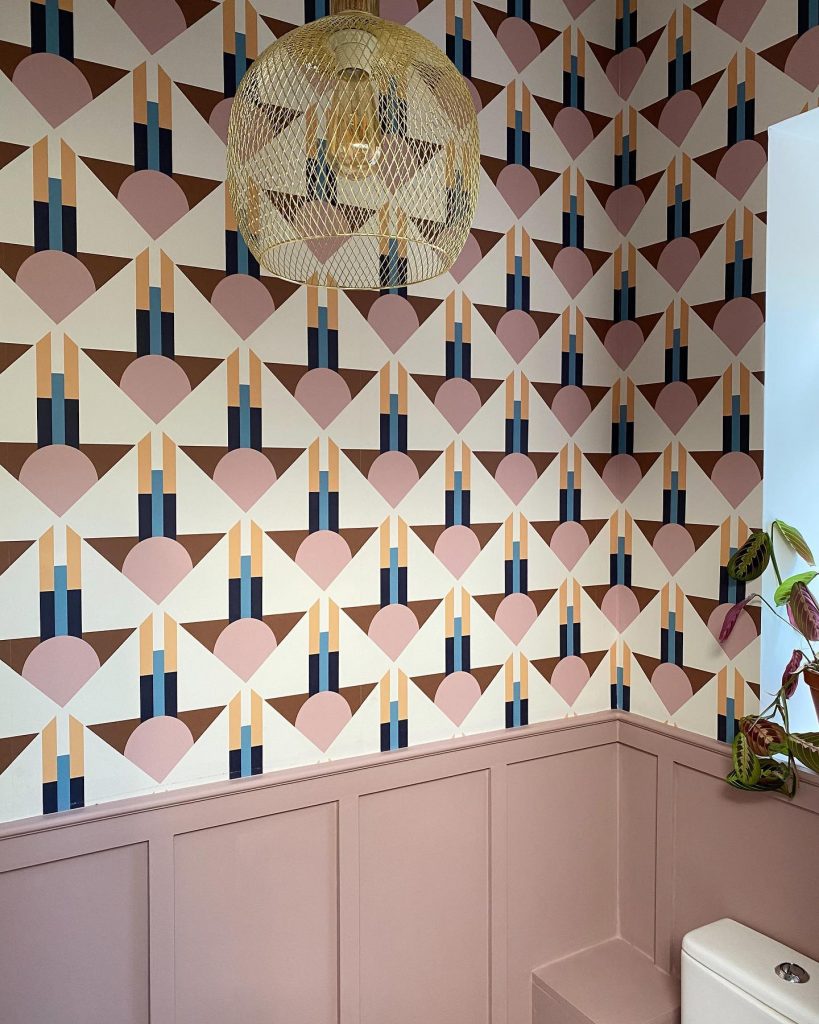 Small Pink Bathroom with Paneling and Wallpaper