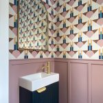Small Pink Bathroom with Paneling and Wallpaper