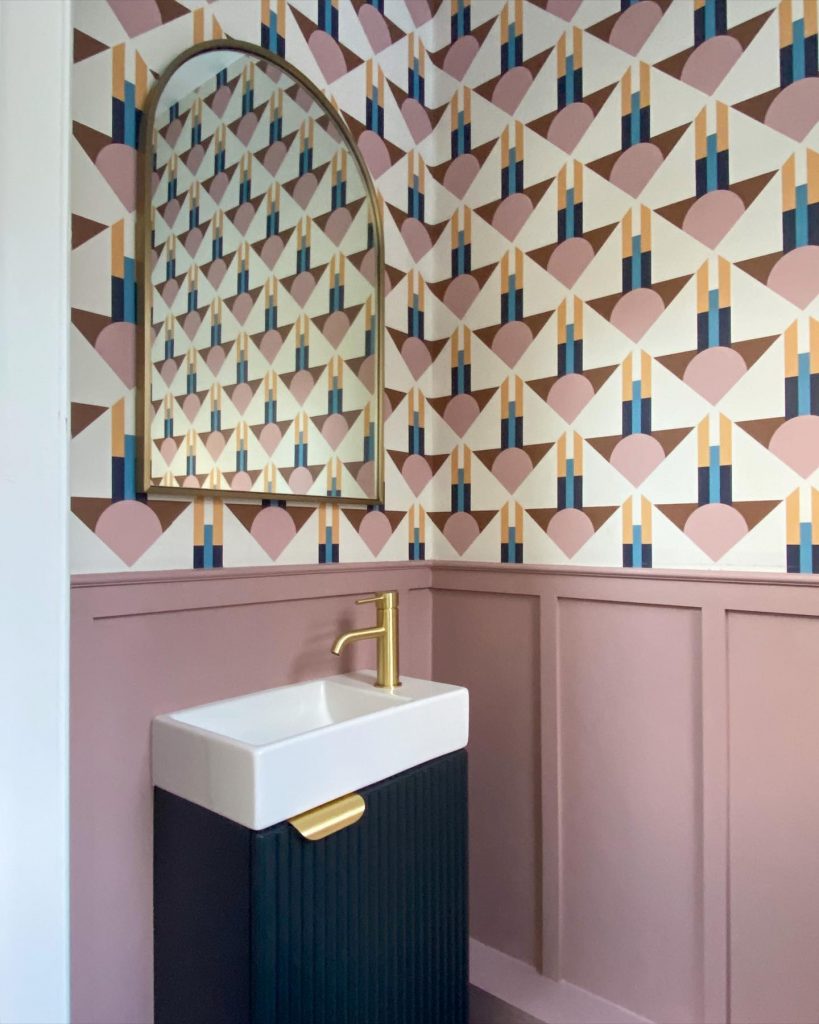 Small Pink Bathroom with Paneling and Wallpaper