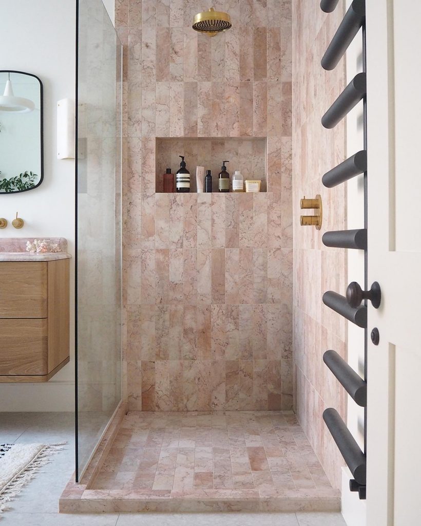 pink marble shower splashback