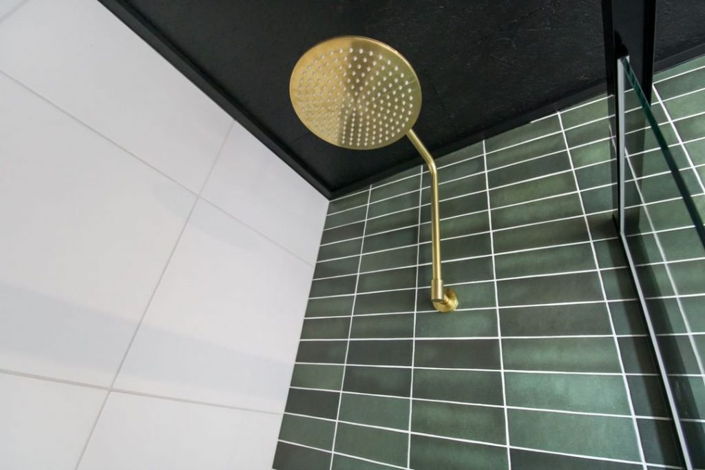 green and gold bathroom hardware