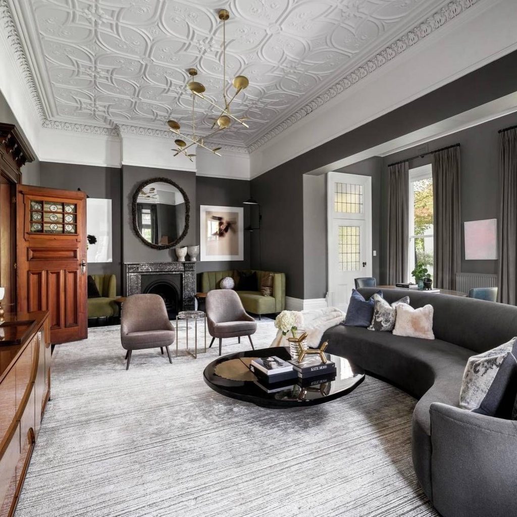 Contemporary living room with dark gray painted walls