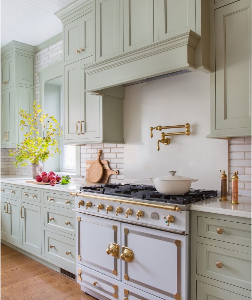 Pastel green and gold kitchen