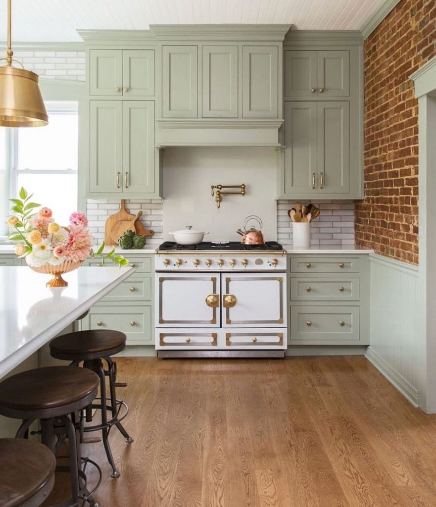 country kitchen design in green and gold 2022