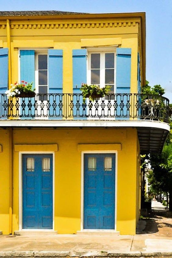 Blue and yellow house exterior