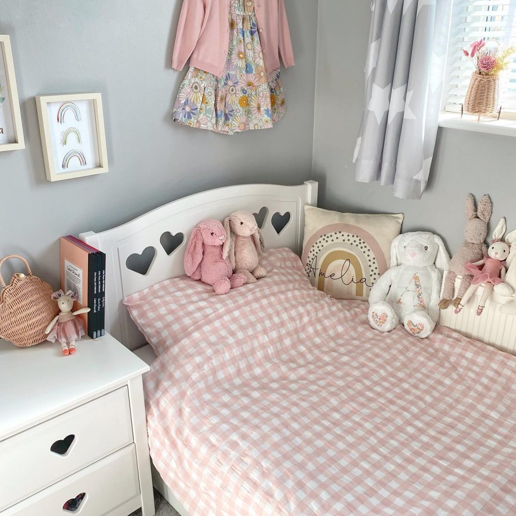 Light gray walls and pink bedding girls bedroom