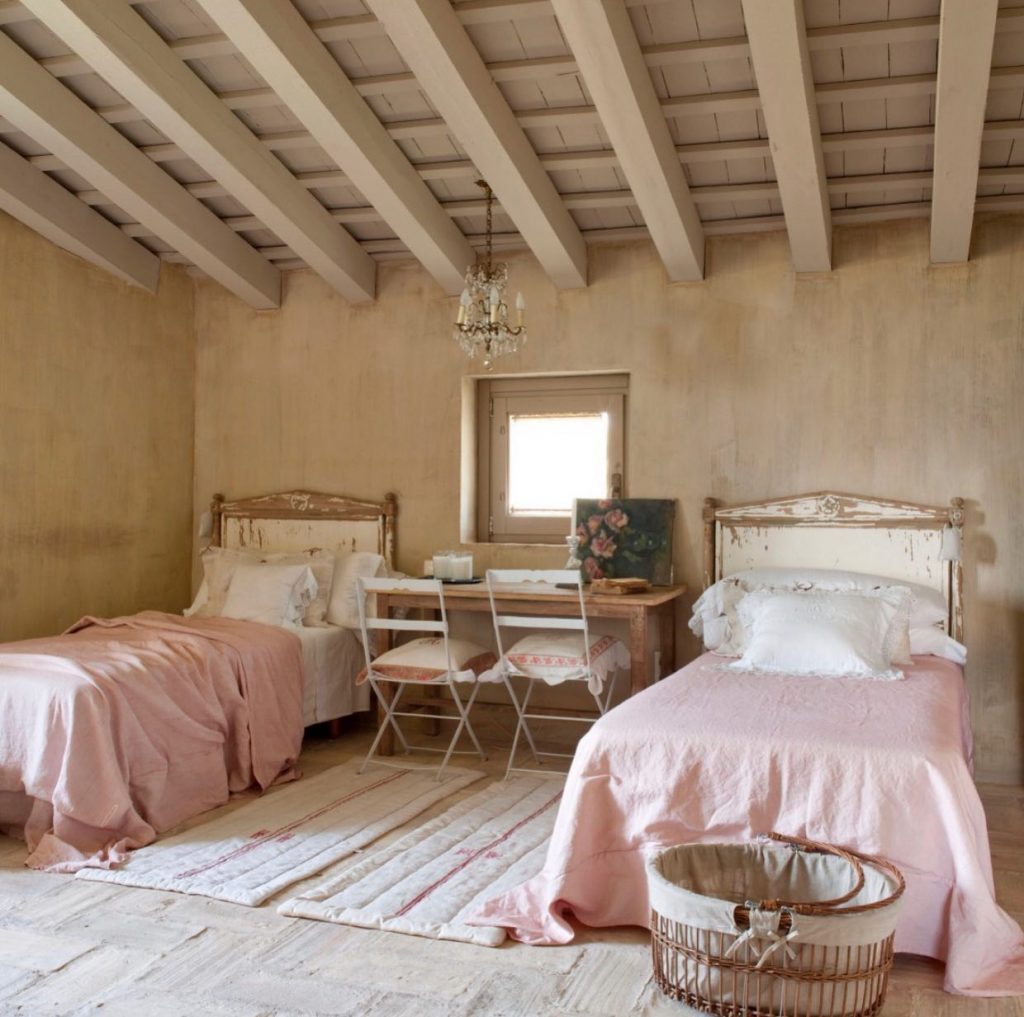 Farmhouse twin bedroom design in neutral, beige and light pink.