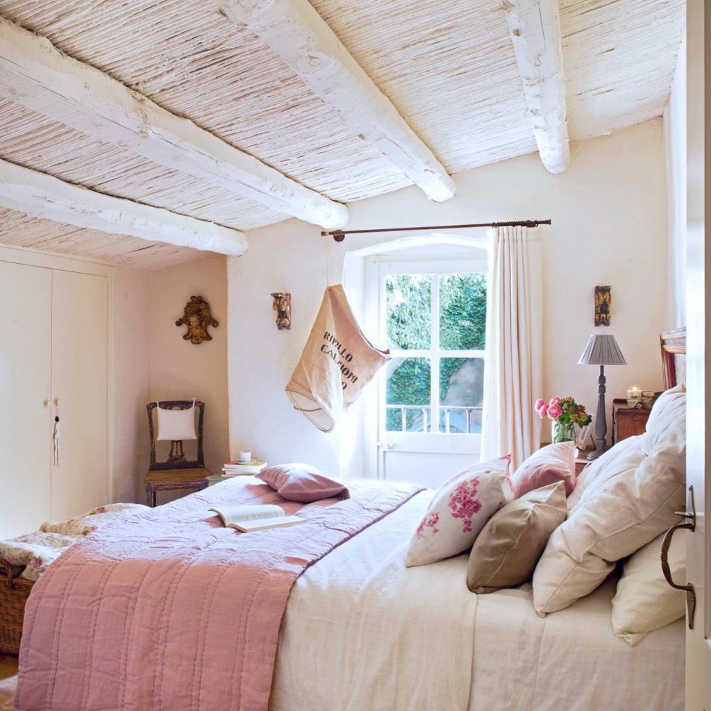 White and pastel pink barn bedroom