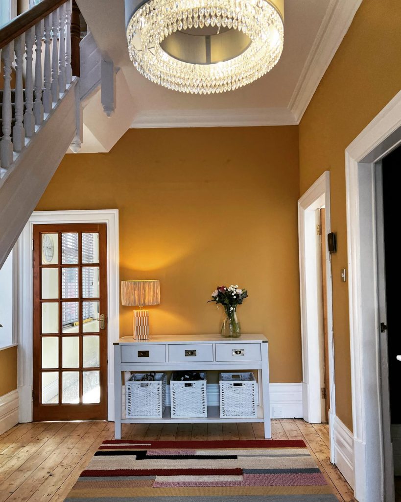 Farrow and Ball Indian Yellow walls entrance