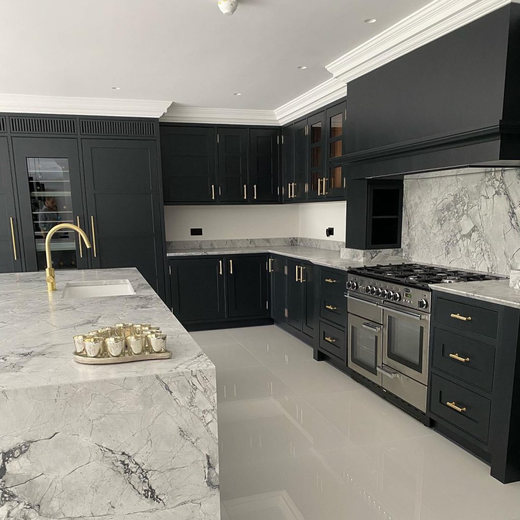 black kitchen cabinets and marble kitchen island