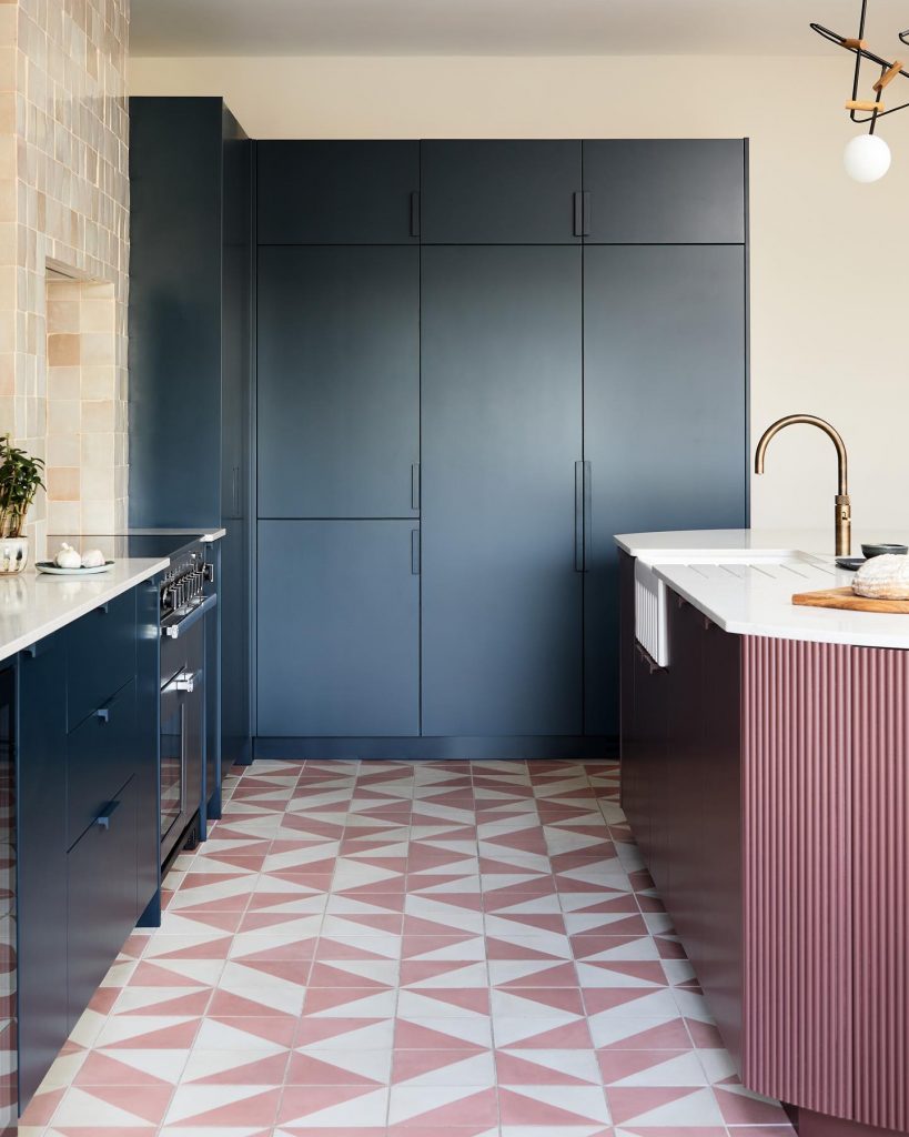 navy and pink color scheme kitchen