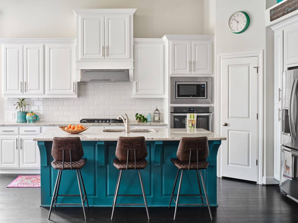 Sherwin Williams Extra White and kitchen island painted in Naples Blue