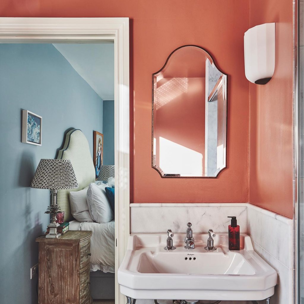 bathroom with terracotta red walls