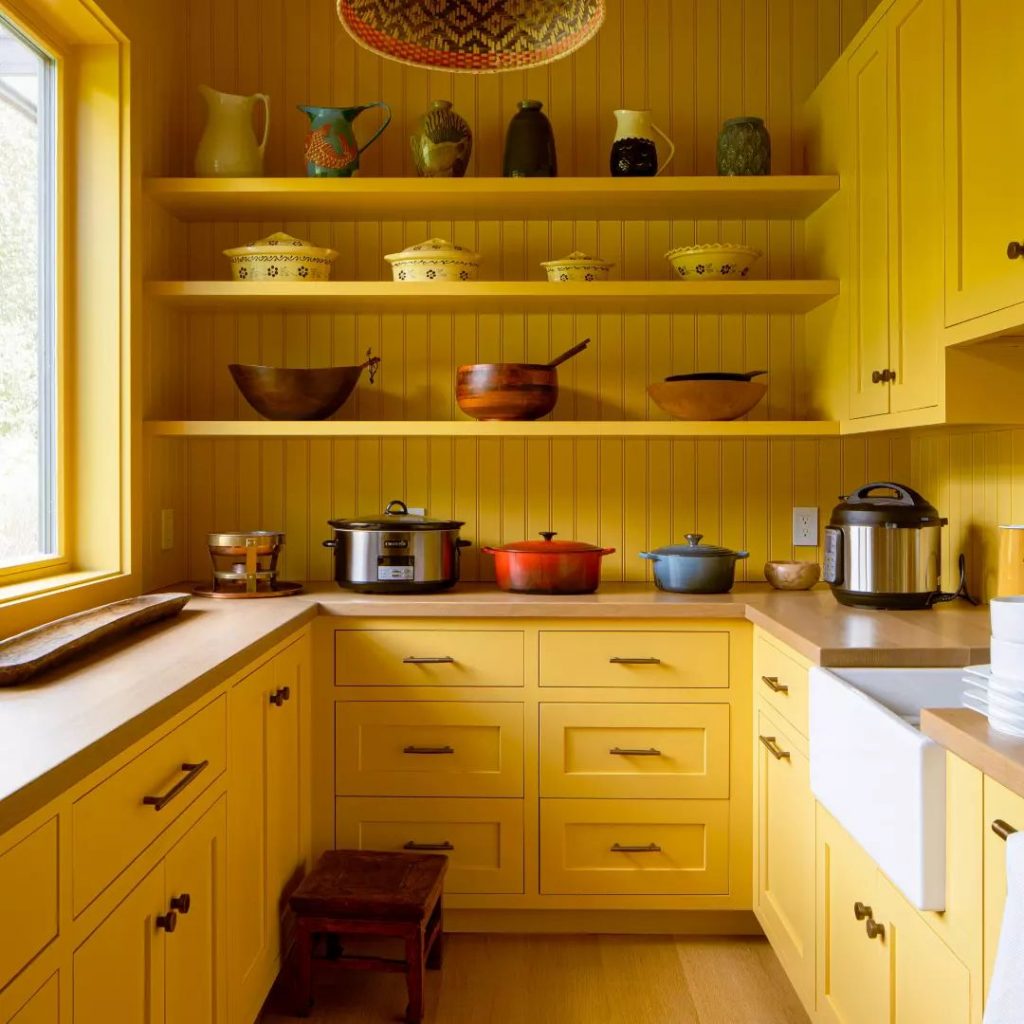 yellow painted pantry interior