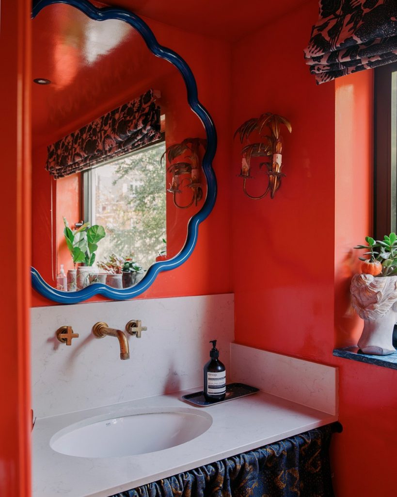 small red painted bathroom walls and ceiling
