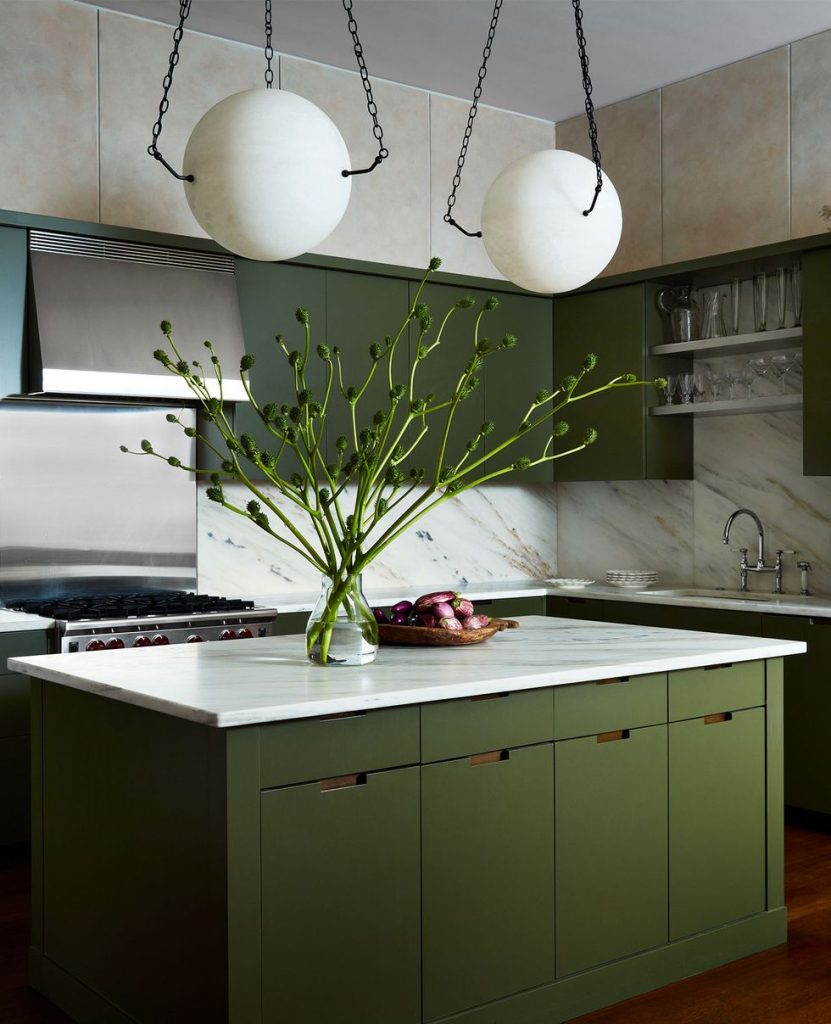 Behr’s Russian Olive green kitchen cabinets and island
