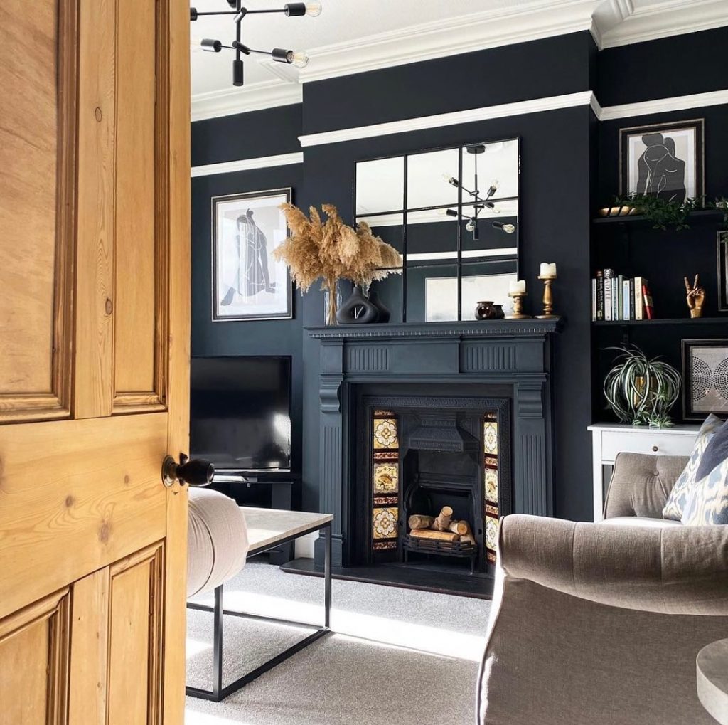 Benjamin Moore Midnight black painted fireplace and wall