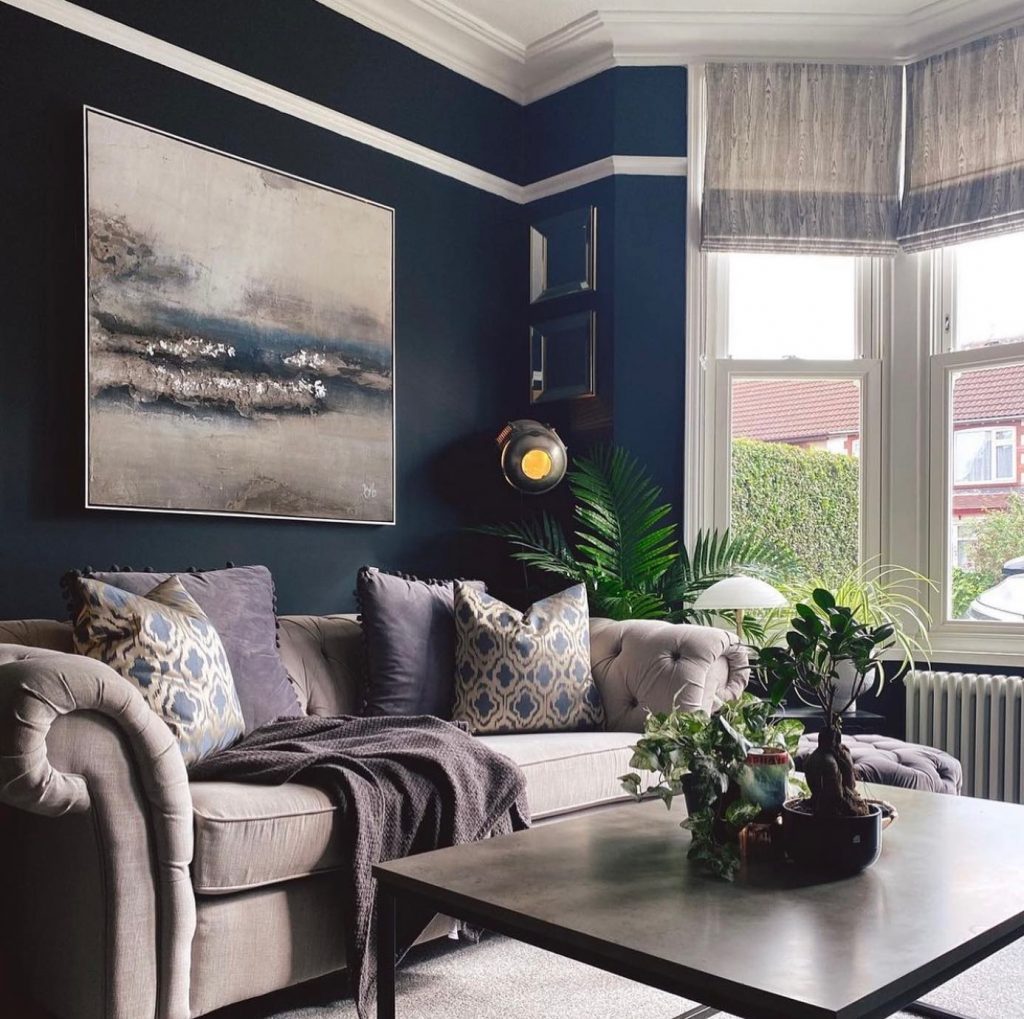 living room with black painted wall