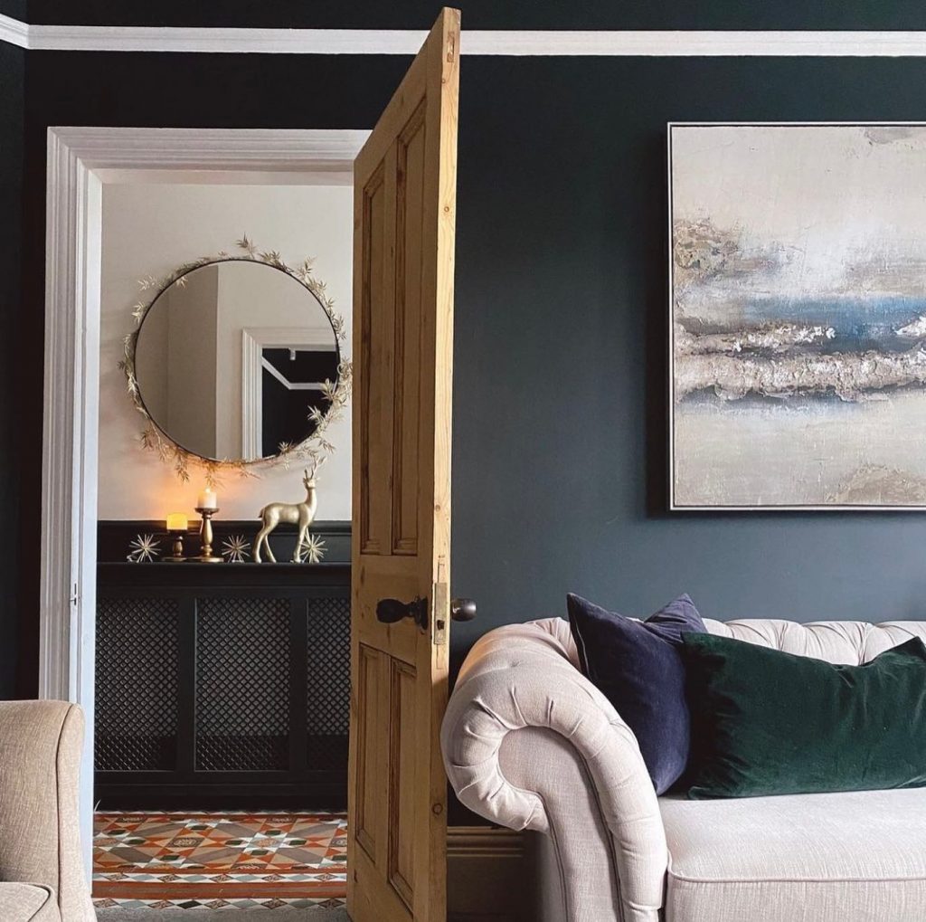 living room with black painted wall terrace