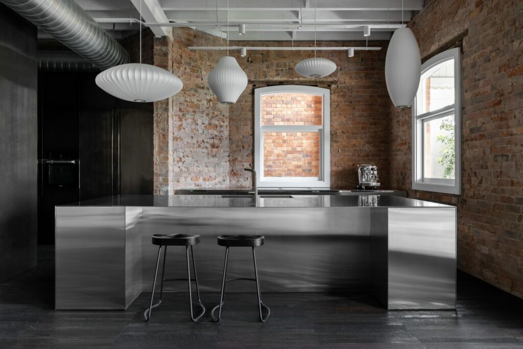 Carr Design Group, kitchen with stainless steel and exposed brick