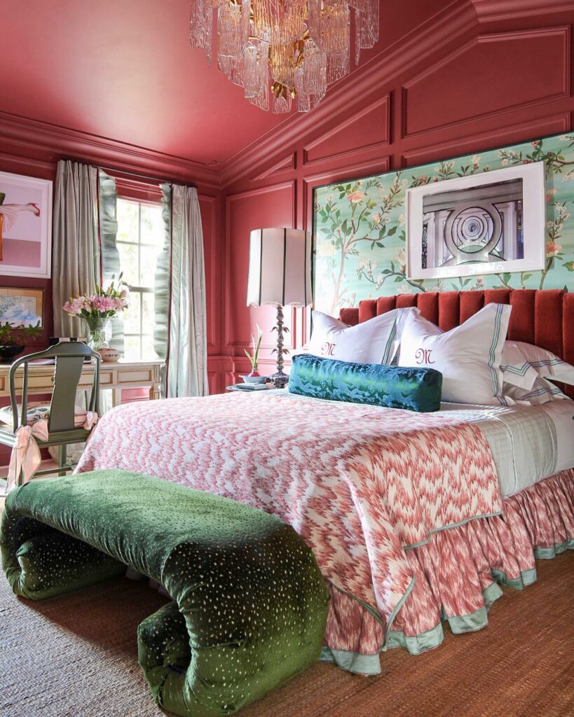 Benjamin Moore Cinnabar red walls and ceilings with green accents bedroom