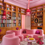 Pink Curved Sofa & Blown Glass Lighting: Maximalist Library Design Ideas