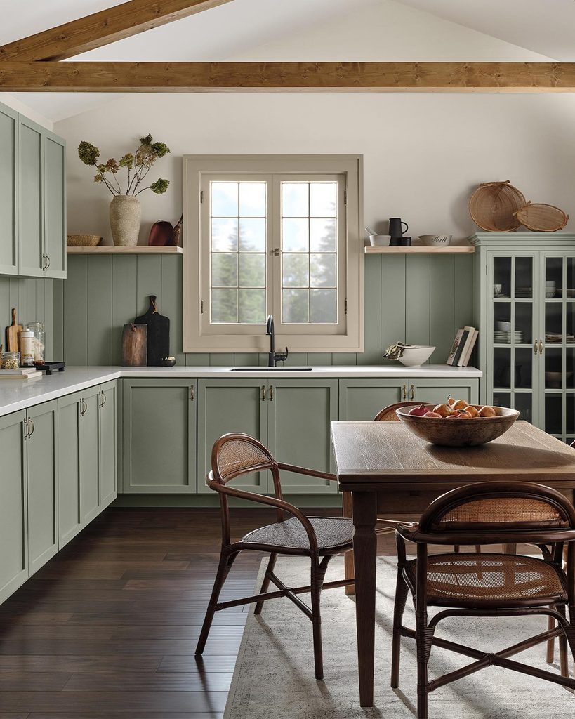 farmhouse kitchen with sage green cabinets painted in Sherwin-Williams Evergreen Fog SW 9130